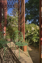 Republic of Ireland, County Donegal, Gartan, 19th century Glebe House and Gallery, former home of the renowned English artist Derek Hill who lived there from 1954 until 1982, green chair in the buildi...