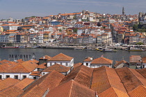 Portugal, Porto, Vila Nova de Gaia, View over the rooftops and the River Douro towards the Ribeira area of Porto.
