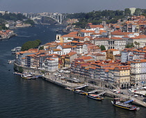 Portugal, Porto, Vila Nova de Gaia, View over the River Douro towards the Ribeira area of Porto with Ponte da Arrabida which links Porto to Vila Nova de Gaia and was opeded in 1963.