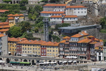 Portugal, Porto, View of the Ribeira area of Porto with The Elevador da Ribeira or Elevador da Lada urban elevator seen from the Dom Luis I Bridge or Ponte de Dom Luis 1.