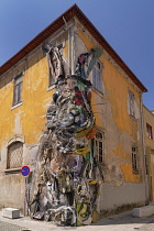 Portugal, Vila Nova de Gaia, The Half Rabbit artwork by Artur Bordalo who calls himself Bordalo II created from discarded items as a critique of human wastefulness.
