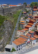 Portugal, Porto, View of the The Guindais Funicular that connects the riverside with Praca da Batalha situated uphill, as seen here from Dom Luis I Bridge or Ponte de Dom Luis I.