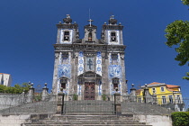 Portugal, Porto, Facade of the 18th century azulejo clad Igreja de Santo Ildefonso or Church of Saint Ildefonso with approximately 11,000 azulejo tiles created by artist Jorge Colaco and placed in Nov...