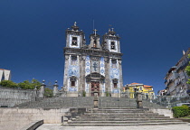 Portugal, Porto, Facade of the 18th century azulejo clad Igreja de Santo Ildefonso or Church of Saint Ildefonso with approximately 11,000 azulejo tiles created by artist Jorge Colaco and placed in Nov...