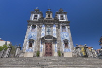 Portugal, Porto, Facade of the 18th century azulejo clad Igreja de Santo Ildefonso or Church of Saint Ildefonso with approximately 11,000 azulejo tiles created by artist Jorge Colaco and placed in Nov...