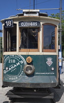 Portugal, Porto, Traditional tram for the city's much touristed Line 18 pictured stationery at the Clerigos Church terminus.