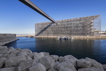 France, Provence, Marseille, Museum of European and Mediterranean Civilisations or MUCEM, a cube of 15,000 square metres or 160,000 sq ft surrounded by a latticework shell of fibre-reinforced concrete...