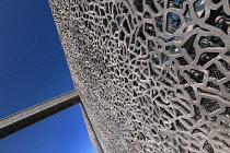 France, Provence, Marseille, Museum of European and Mediterranean Civilisations or MUCEM, a cube of 15,000 square metres or 160,000 sq ft surrounded by a latticework shell of fibre-reinforced concrete...