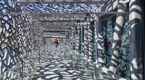 France, Provence, Marseille, Museum of European and Mediterranean Civilisations or MUCEM, a cube of 15,000 square metres or 160,000 sq ft surrounded by a latticework shell of fibre-reinforced concrete...