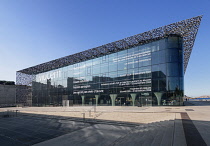 France, Provence, Marseille, Glass facade of the Museum of European and Mediterranean Civilisations or MUCEM, a cube of 15,000 square metres or 160,000 sq ft surrounded by a latticework shell of fibre...