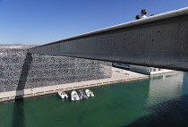 France, Provence, Marseille, Museum of European and Mediterranean Civilisations or MUCEM, a cube of 15,000 square metres or 160,000 sq ft surrounded by a latticework shell of fibre-reinforced concrete...