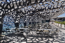 France, Provence, Marseille, Museum of European and Mediterranean Civilisations or MUCEM, a cube of 15,000 square metres or 160,000 sq ft surrounded by a latticework shell of fibre-reinforced concrete...