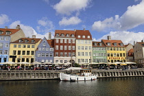 Denmark, Copenhagen, Nyhavn Historic quay and warehouses. Restaurant district