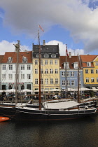 Denmark, Copenhagen, Nyhavn Historic quay and warehouses. Restaurant district